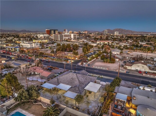 aerial view at dusk with a mountain view