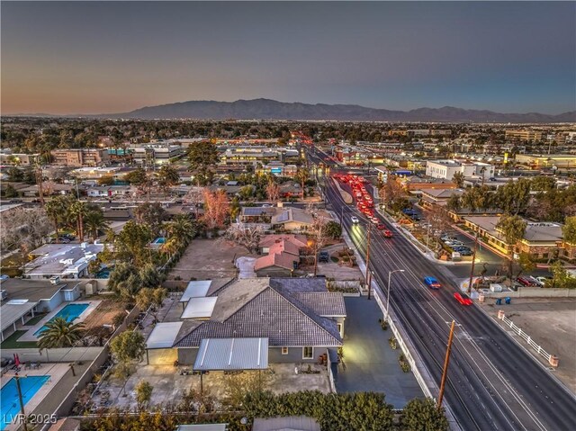 aerial view at dusk with a mountain view