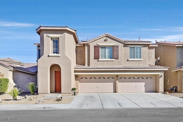 view of front of property with a garage