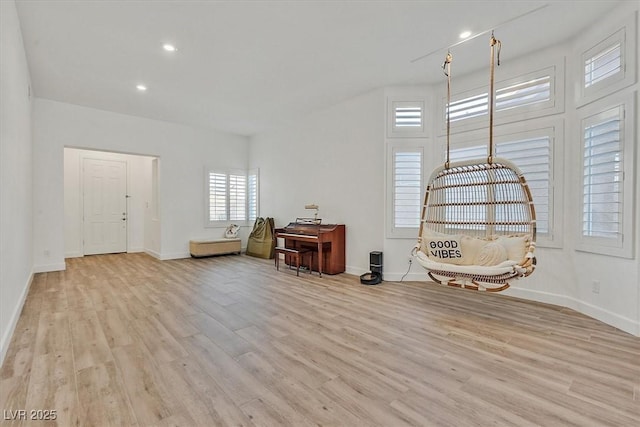 unfurnished room with light hardwood / wood-style flooring