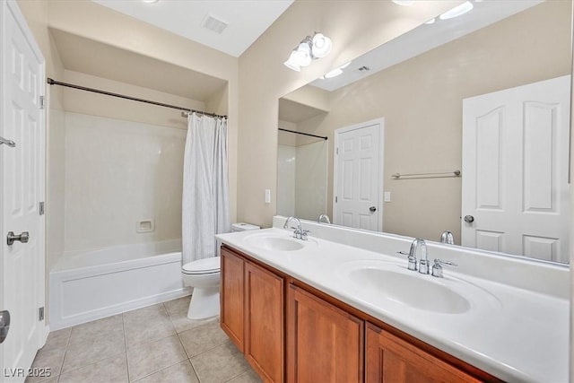 full bathroom featuring vanity, tile patterned floors, shower / bath combination with curtain, and toilet