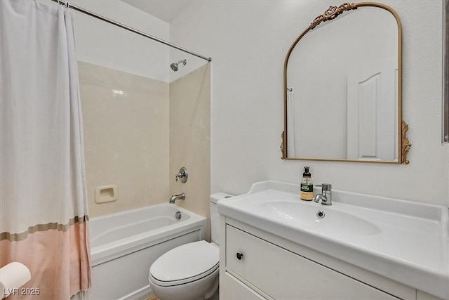 full bathroom with vanity, shower / tub combo, and toilet