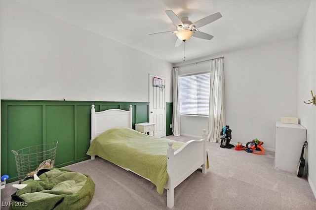 bedroom featuring ceiling fan and light colored carpet