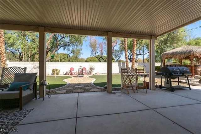 view of patio / terrace featuring a gazebo and grilling area