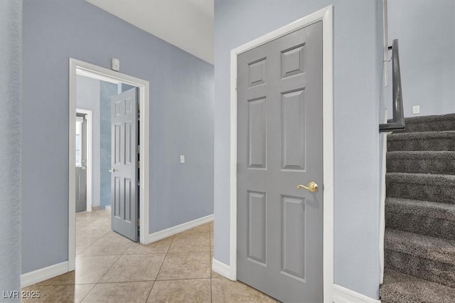 interior space featuring light tile patterned floors