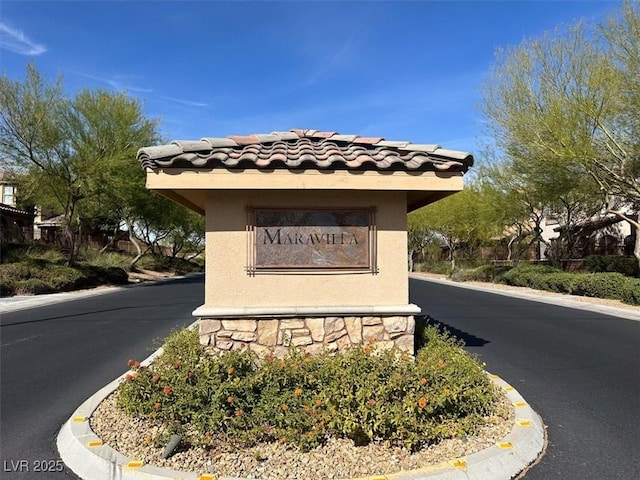 view of community sign