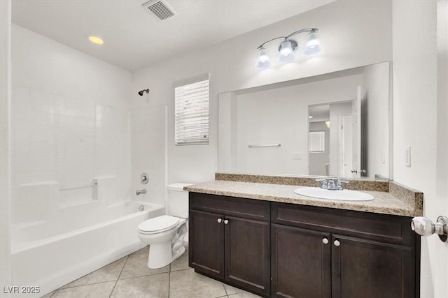 full bathroom featuring vanity, tub / shower combination, tile patterned floors, and toilet