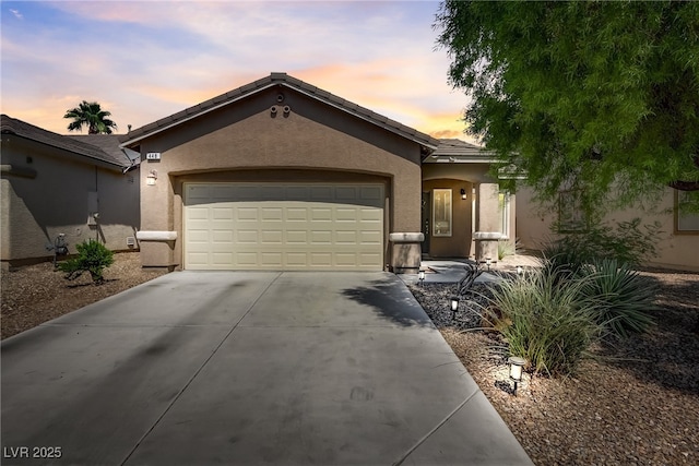 single story home featuring a garage