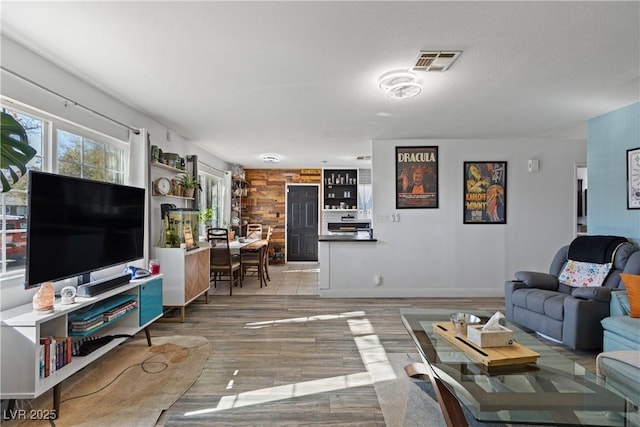 living room with hardwood / wood-style floors