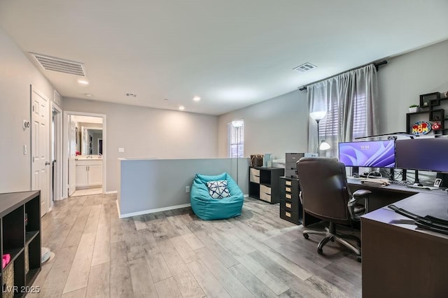 office space featuring light hardwood / wood-style flooring