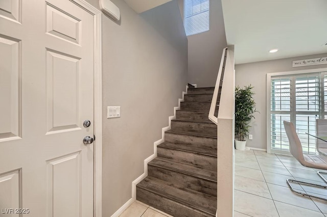 stairs with tile patterned floors