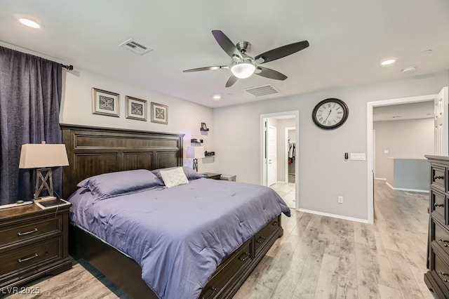 bedroom featuring ceiling fan and light wood-type flooring