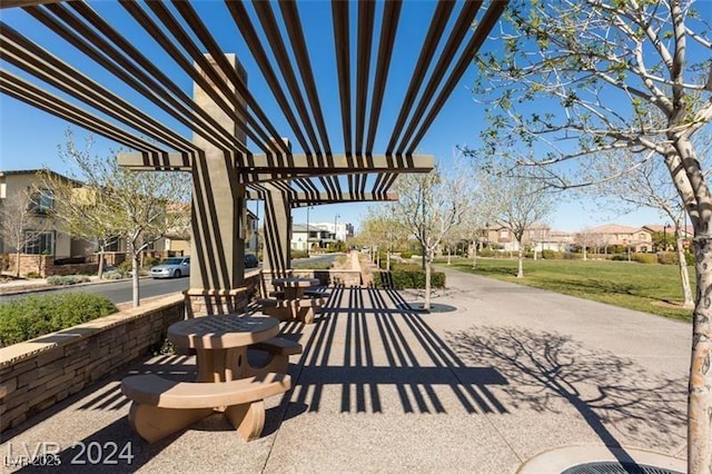 surrounding community featuring a pergola