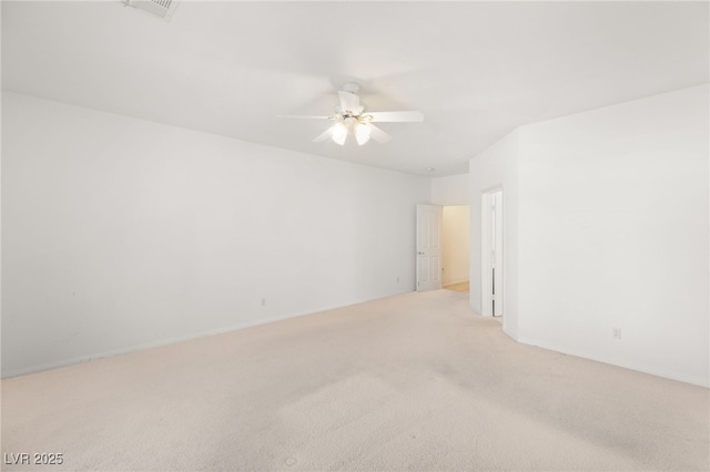 carpeted empty room with ceiling fan