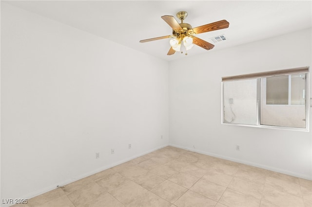 spare room with ceiling fan