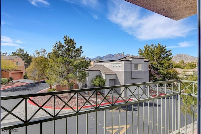 view of gate with a mountain view