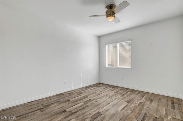 empty room featuring light hardwood / wood-style floors and ceiling fan