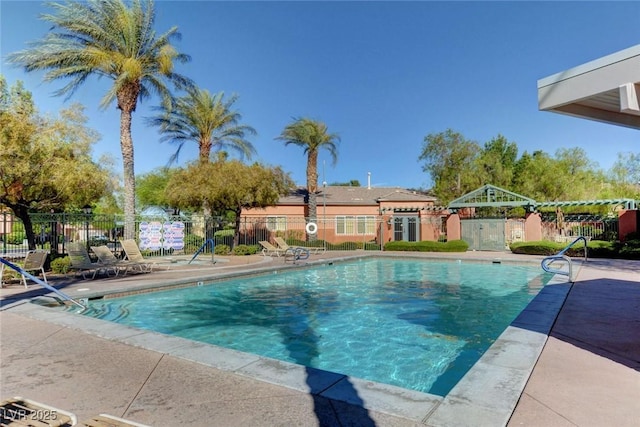 view of swimming pool with a patio area