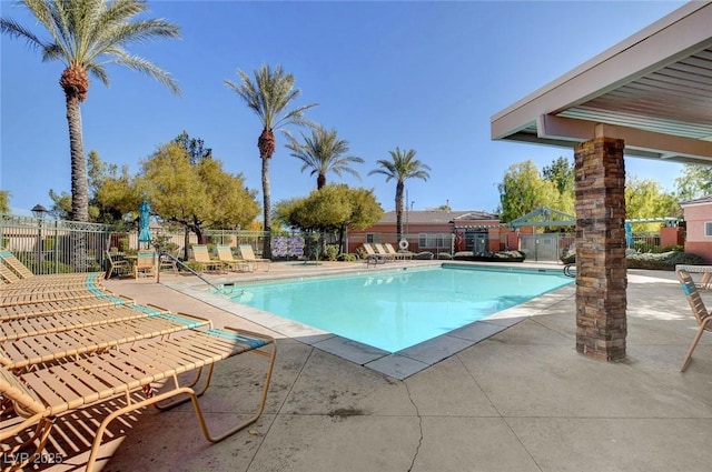 view of swimming pool featuring a patio