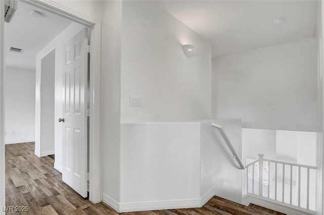 corridor featuring hardwood / wood-style flooring