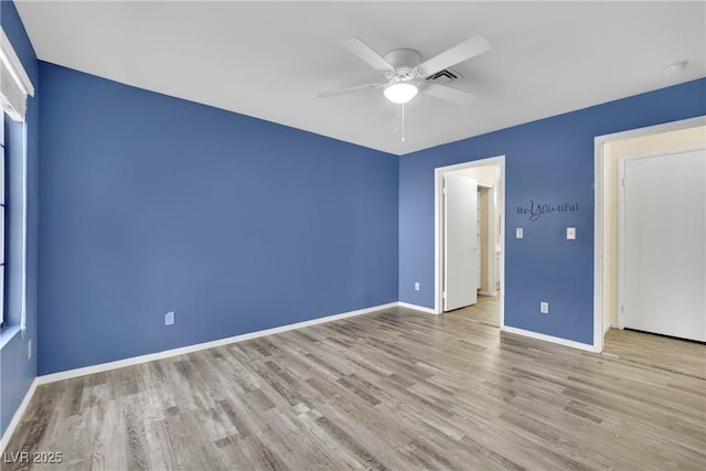 unfurnished bedroom with ceiling fan and light hardwood / wood-style floors