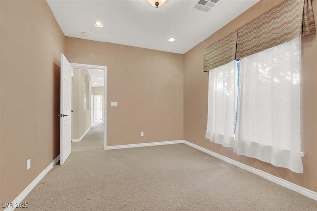 view of carpeted spare room