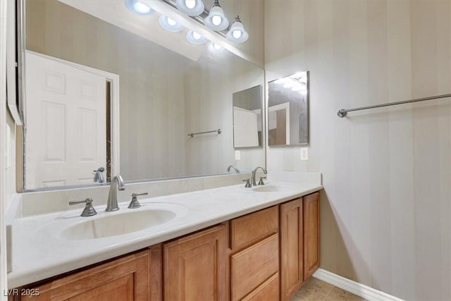 bathroom with vanity and tile patterned floors