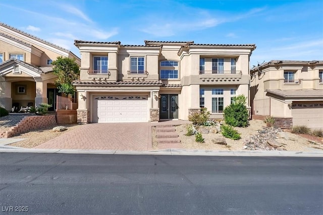 view of front of property featuring a garage