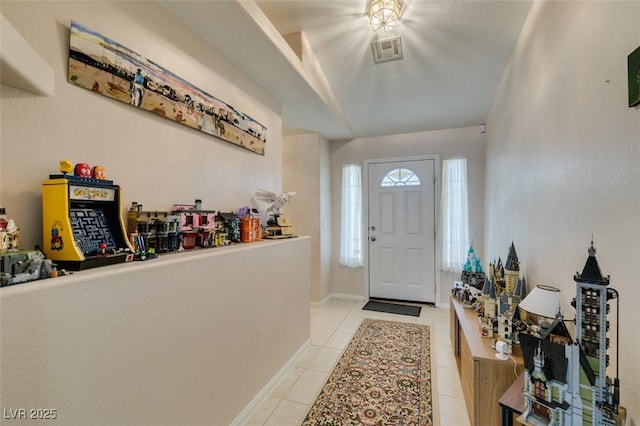 view of tiled entrance foyer