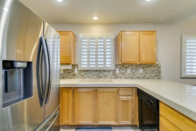 kitchen featuring sink, decorative backsplash, dishwasher, and stainless steel refrigerator with ice dispenser