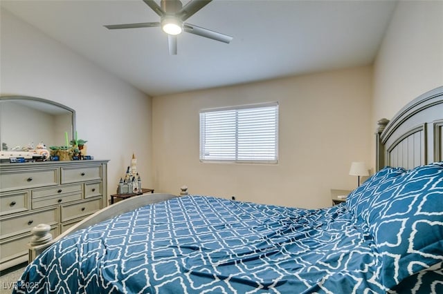 bedroom with vaulted ceiling and ceiling fan