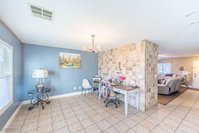 tiled office space featuring a notable chandelier