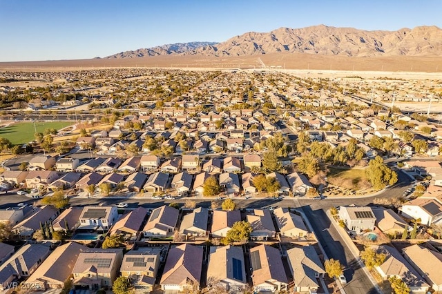 birds eye view of property featuring a mountain view