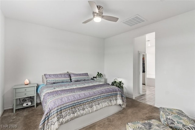 bedroom with ceiling fan and carpet