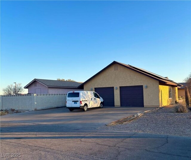 exterior space with a garage