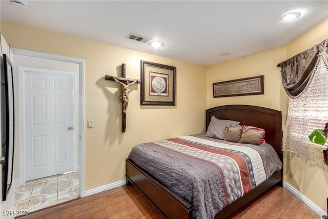 bedroom featuring hardwood / wood-style floors