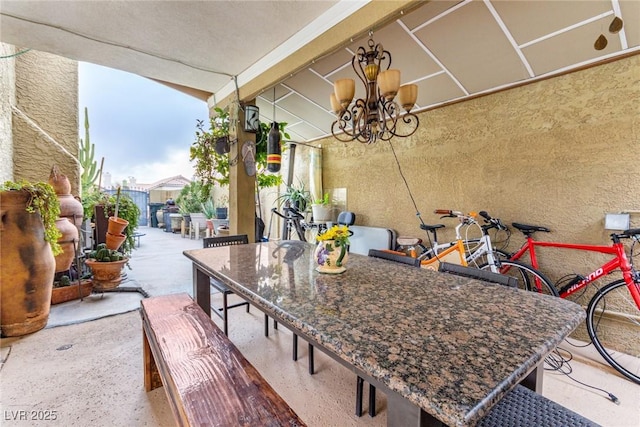 view of patio featuring an outdoor bar