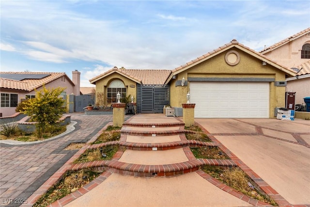 view of front of property featuring a garage