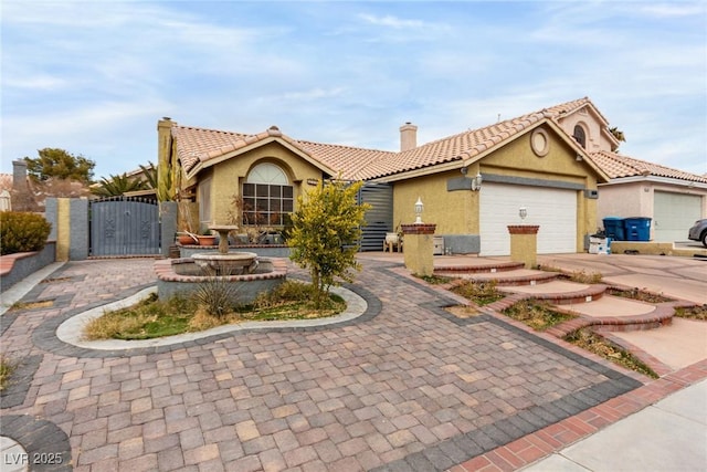 view of front of property featuring a garage