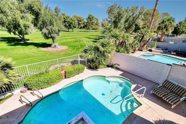 view of pool with a lawn