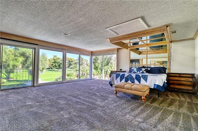 bedroom featuring crown molding, carpet floors, a textured ceiling, and access to outside