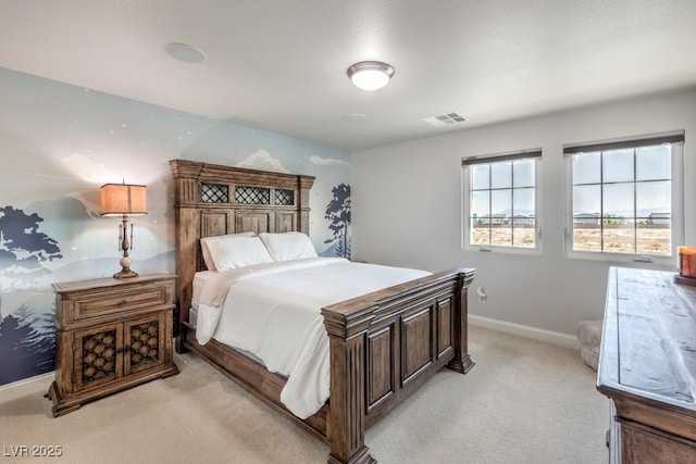 bedroom featuring light carpet