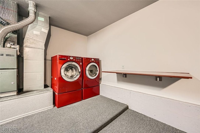 laundry room with washer and clothes dryer