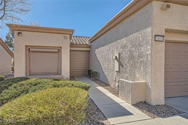 exterior space with a garage