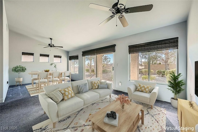 living room featuring ceiling fan and light carpet