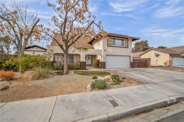 front of property with a garage