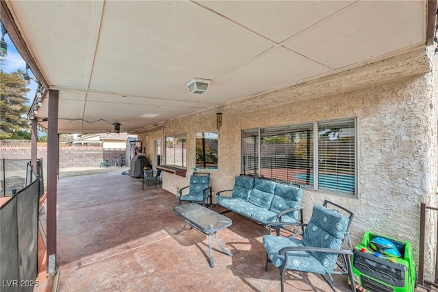 view of patio / terrace with area for grilling and outdoor lounge area