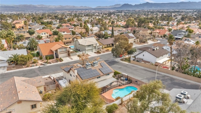 birds eye view of property featuring a mountain view