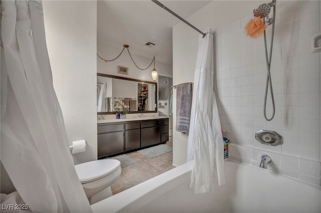 full bathroom featuring shower / tub combo, vanity, and toilet