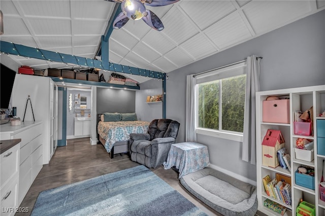 bedroom with lofted ceiling